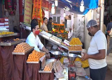 A static shot people buying sweets from a sweets shop