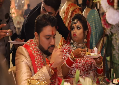 9th February,2019: A Shot of Newly-Wed Indian Couple enjoying and having food at their Indian Wedding in New Delhi, India