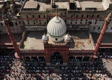 An aerial shot of Jama Masjid with people praying namaz in New Delhi,India