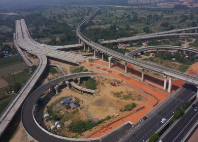 An aerial shot of the Delhi metro entering the station at Mayur Vihar,New Delhi, India