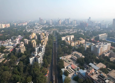An Aerial shot of Delhi metro going in the underground Tunnel at Connaught Place in New Delhi, India