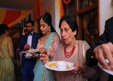 New Delhi,NCR,India-9th February,2019: Shot of relatives having food\lunch before leaving for Big Fat Indian Wedding baraat in New Delhi,India
