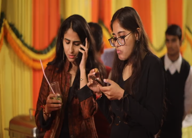 New Delhi,NCR,India-7th February,2019: Shot of two Indian sisters at their brothers Big Fat Indian wedding mehendi function in New Delhi, India