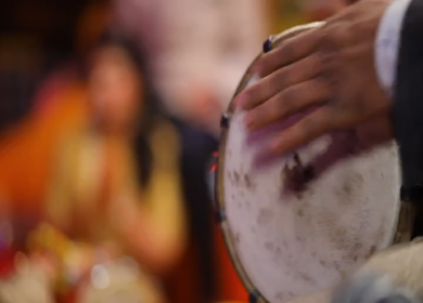 New Delhi,NCR,India-7th February,2019: Shift Focus Shot of an Indian girl clapping on a song at her brothers Big Fat Indian wedding mehendi function in New Delhi, India