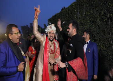 New Delhi,NCR,India-9th February,2019: Shot of an Indian Groom and his relatives dancing at Big Fat Indian Wedding baraat in New Delhi,India