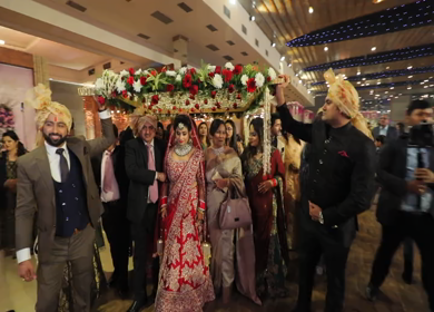 9th February,2019: A Dolly shot of an Indian Bride entering with her brothers at an wedding in New Delhi,India