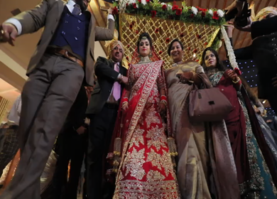 9th February,2019: A low angle shot of an Indian Bride entering with her brothers, parents and relatives at her Indian wedding in New Delhi,India