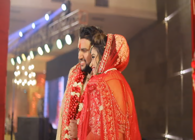 New Delhi,NCR,India-9th February,2019: Shot of a Indian Groom and Bride posing towards camera at their Indian wedding in New Delhi,India