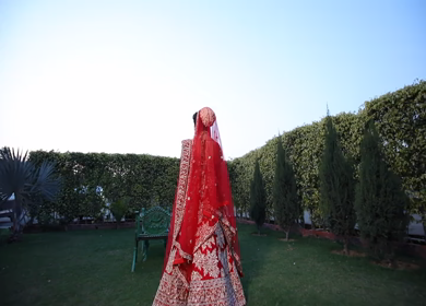 Shot of beautiful Indian Bride posing and smiling for her wedding shoot in New Delhi, India