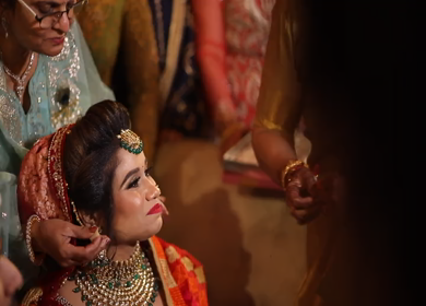 New Delhi,NCR,India-9th February,2019: Shot of Indian relatives making Indian bride eat sweets at her wedding venue in New Delhi,India