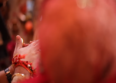 Track Shot of an Indian Bride and Indian Groom doing Puja,traditions at their Indian wedding in New Delhi, India
