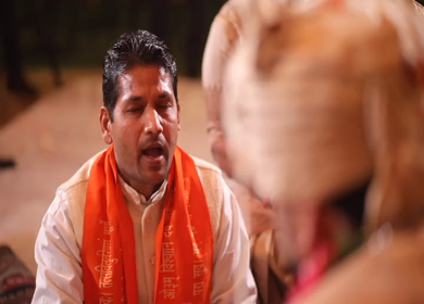 New Delhi,NCR,India-9th February,2019: Shot of an Indian pandit explaining the Indian Groom while Puja,traditions at an Indian wedding in New Delhi, India