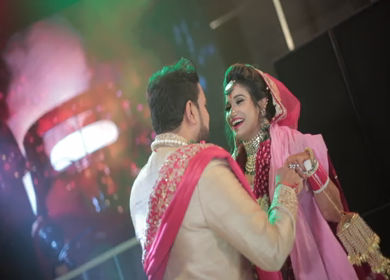 New Delhi,NCR,India-9th February,2019: Slow Motion Shot of a Indian Groom bending on his knees for his wife at the dance floor at their Indian wedding in New Delhi,India