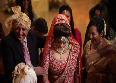 9th February, 2019: A shot of the happy bride with her parents at the wedding in New Delhi, India