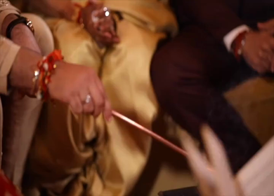 A shot of the groom fullfilling all the rituals at his wedding in New Delhi, India