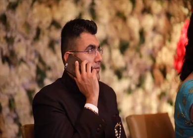 9th February, 2019: A shot of an Indian man talking on the phone at a wedding in New Delhi, India