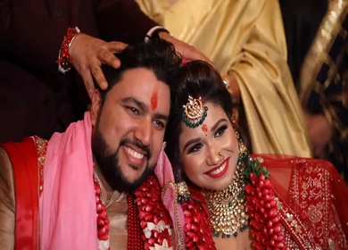 9th February, 2019: A shot of the bride and groom happily taking a picture at their wedding in New Delhi, India