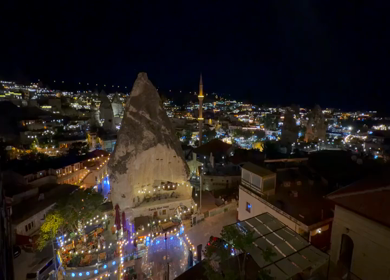Night Panorama of Goreme Town Illuminated in Cappadocia Turkey