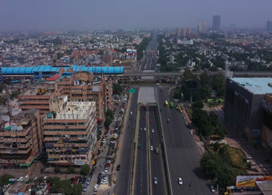  29th September 2020- An Aerial Shot of Delhi Metro entering Noida Metro Station at ,Noida,NCR,India