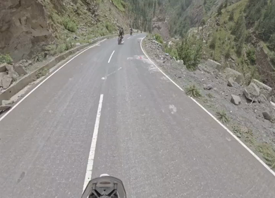 POV Motorcycle Ride Through Scenic Mountain Roads in Ladakh India
