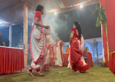 28th September 2025 : A Shot of People Performing Traditional Dance at Durga Puja Pandal Delhi India