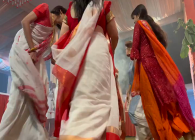 28th September 2025 : A Shot of People Performing Traditional Dance at Durga Puja Pandal Delhi India