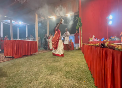 28th September 2025 : A Shot of People Performing Traditional Dance at Durga Puja Pandal Delhi India