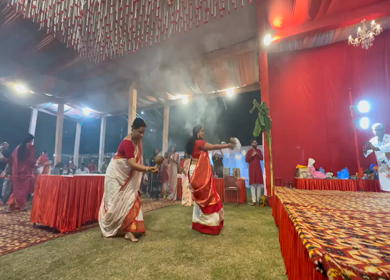 28th September 2025 : A Shot of People Performing Traditional Dance at Durga Puja Pandal Delhi India