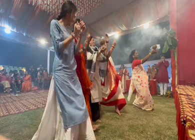 28th September 2025 : A Shot of People Performing Traditional Dance at Durga Puja Pandal Delhi India