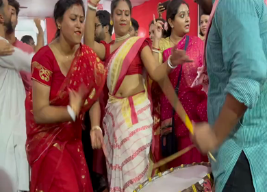 28th September 2025 : A Shot of People Performing Traditional Dance at Durga Puja Pandal Delhi India