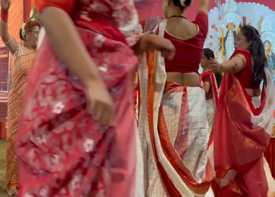 28th September 2025 : A Shot of People Performing Traditional Dance at Durga Puja Pandal Delhi India