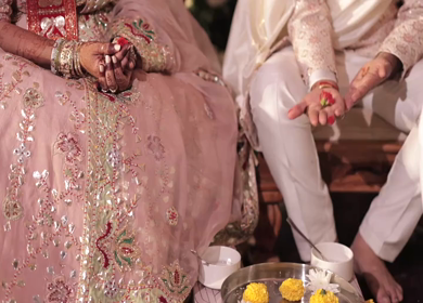 A Slow Motion Shot of an Indian Wedding where rituals are being performed in India
