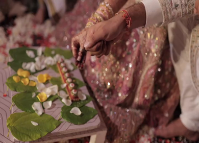 A Slow Motion Shot of an Indian Wedding where rituals are being performed in India
