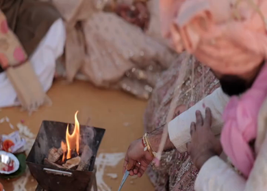 A Slow Motion Shot of an Indian Wedding where rituals are being performed in India