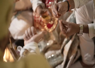 A Slow Motion Shot of an Indian Wedding where rituals are being performed in India