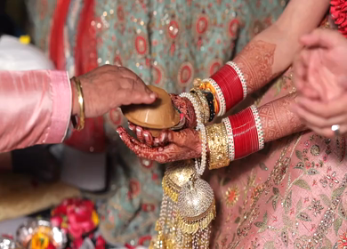 A shot of an Indian Wedding where rituals are being performed at New Delhi, India