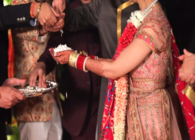 A shot of an Indian Wedding where rituals are being performed at New Delhi, India