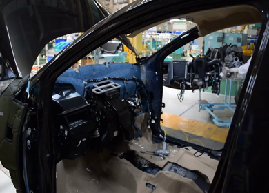 Greater Noida, CIRCA April 2017: Dashboard being fixed in the car at car manufacturing plant in india
