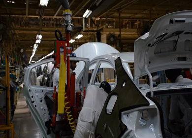 Greater Noida, CIRCA April 2017: Car doors being detached at car manufacturing plant in India