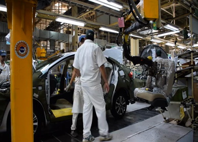 Greater Noida, CIRCA April 2017: Seat being fixed in a car at car manufacturing plant in India