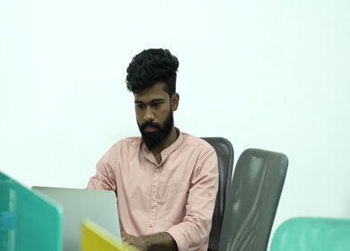 A shot of Indian colleagues having a casual conversation in their office conference room 