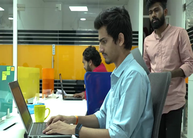 A shot of Indian colleagues workers working hard Indian office