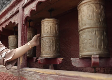 A slow motion Shot of the Buddhist prayer wheels spinning in Leh Ladakh,India