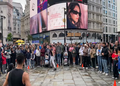 19th June 2024 : Street performers entertaining crowd at Piccadilly Circus London