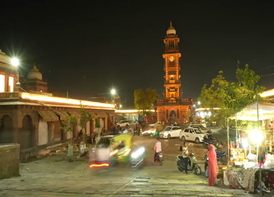 Timelapse of Ghanta Ghar clock tower capturing vibrant night traffic in Jodhpur, India