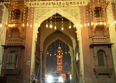 Timelapse of Ghanta Ghar clock tower capturing vibrant night traffic in Jodhpur, India