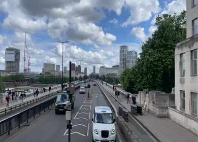 15th June 2024 : Traffic on Waterloo Bridge with London skyline in England