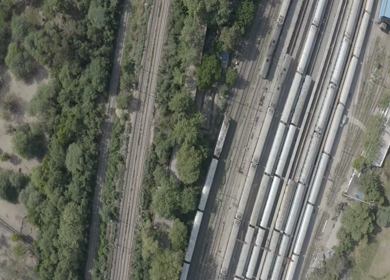 An aerial shot of the Indian Railways Train moving on railway tracks 