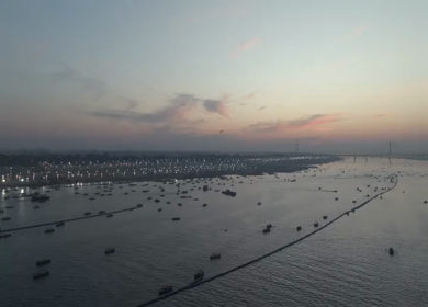Vertical Aerial Night View of Maha Kumbh Mela 2025 in Prayagraj, India