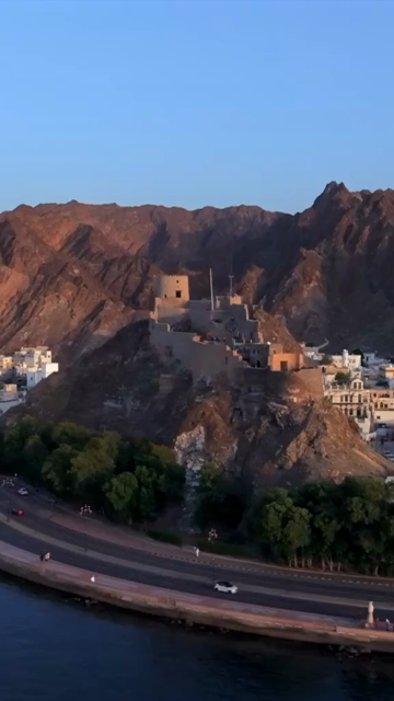 Vertical Aerial Evening View of Al Jalali Fort Old Muscat Oman